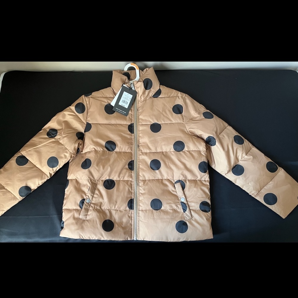Tan puffer coat with polka dots